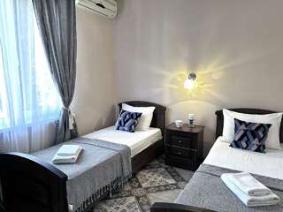 Гостиница Ношен Лазаревское 4-местный номер стандарт семейный-9